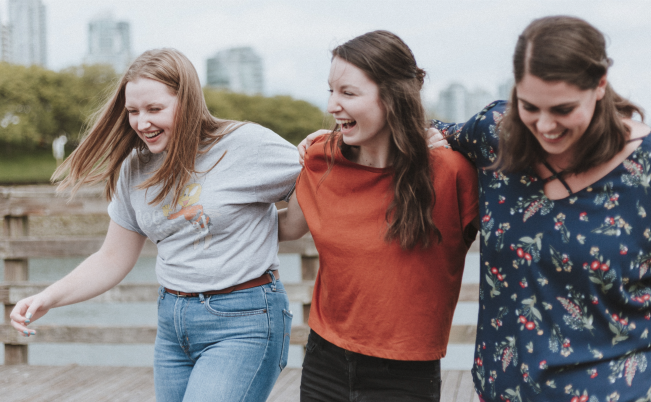 Photo of group of happy women